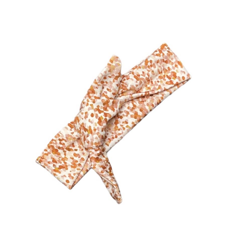 Knoophaarband confetti burnt orange - Baby Winkel Online